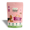 Pink packaging of Naturediet Feel Good dog treats with turkey and salmon flavor on a white background