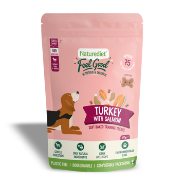 Pink packaging of Naturediet Feel Good dog treats with turkey and salmon flavor on a white background